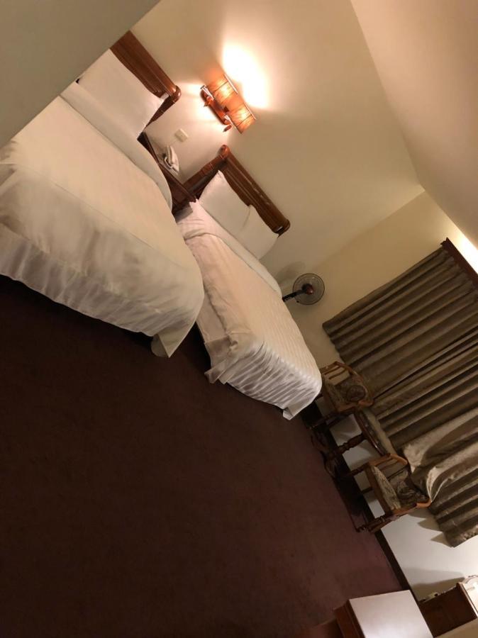 England Business Motel Yilan Esterno foto